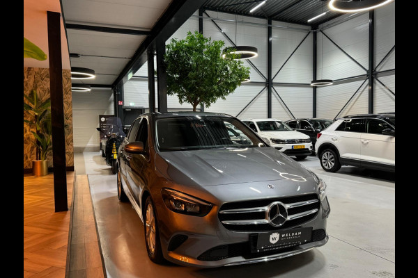 Mercedes-Benz B-Klasse 180 Business Solution Garantie Camera CarPlay PDC Sfeer Leder Lane Cruise Clima Navi Led Dab Rijklaar