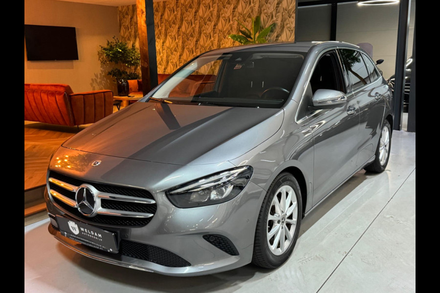 Mercedes-Benz B-Klasse 180 Business Solution Garantie Camera CarPlay PDC Sfeer Leder Lane Cruise Clima Navi Led Dab Rijklaar