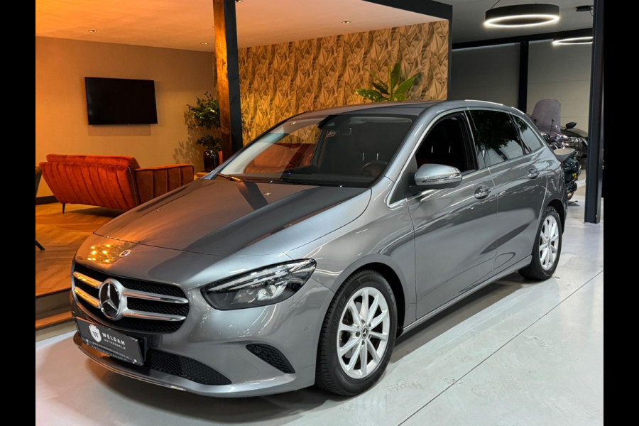 Mercedes-Benz B-Klasse 180 Business Solution Garantie Camera CarPlay PDC Sfeer Leder Lane Cruise Clima Navi Led Dab Rijklaar