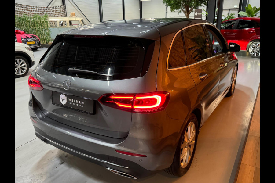 Mercedes-Benz B-Klasse 180 Business Solution Garantie Camera CarPlay PDC Sfeer Leder Lane Cruise Clima Navi Led Dab Rijklaar