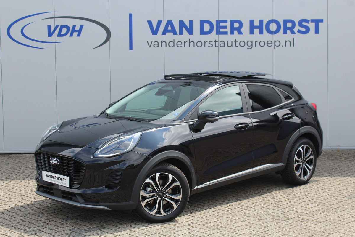 Ford Puma 1.0-125 pk EcoBoost Mild-Hybrid Titanium. Nieuw Mdl. Fabr. garantie t/m 27-01-2029 ! Erg fijn rijdende en comfortabele hoogzitter ! Slechts 3.100km ! Elektr. pano dak, Stoel-, stuur- en voorraamverw., Side- en lane assist, Camera rondom, Navigatie, Telefoonvoorb. etc Ford Puma 1.0-125 pk EcoBoost Mild-Hybrid Titanium. Nieuw Mdl. Fabr. garantie t/m 27-01-2029 ! Erg fijn rijdende en comfortabele hoogzitter ! Slechts 3.100km ! Elektr. pano dak, Stoel-, stuur- en voorraamverw., Side- en lane assist, Camera rondom, Navigatie, Telefoonvoorb. etc