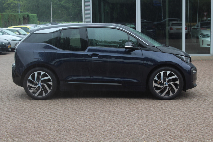 BMW i3 Basis 120Ah 42 kWh / SoH 90.5% / Camera / Navigatie / 19'' / Harman Kardon / Stoelverwarming / Cruise Control / Warmtepomp / Getint glas