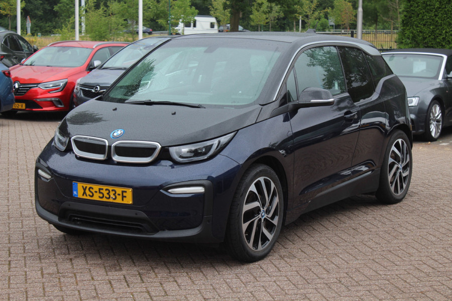 BMW i3 Basis 120Ah 42 kWh / SoH 90.5% / Camera / Navigatie / 19'' / Harman Kardon / Stoelverwarming / Cruise Control / Warmtepomp / Getint glas