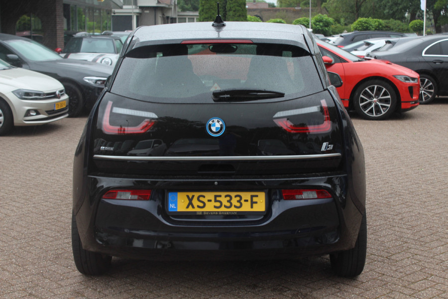 BMW i3 Basis 120Ah 42 kWh / SoH 90.5% / Camera / Navigatie / 19'' / Harman Kardon / Stoelverwarming / Cruise Control / Warmtepomp / Getint glas