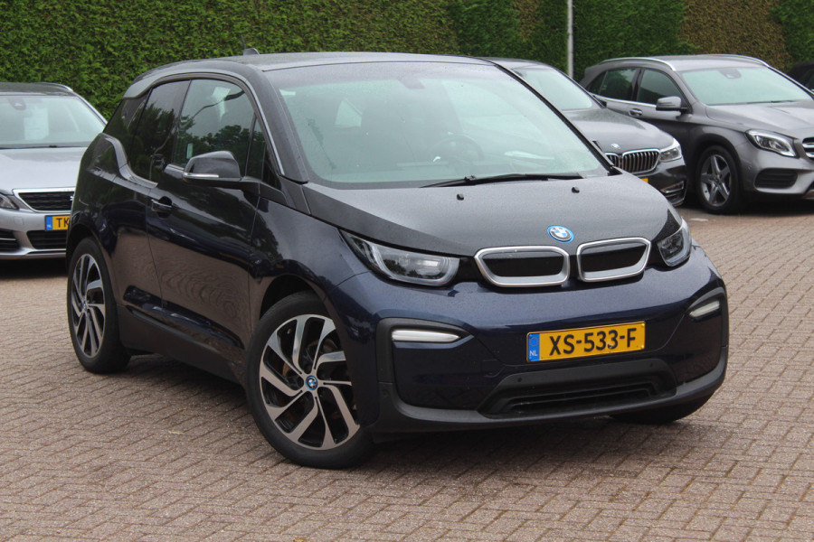 BMW i3 Basis 120Ah 42 kWh / SoH 90.5% / Camera / Navigatie / 19'' / Harman Kardon / Stoelverwarming / Cruise Control / Warmtepomp / Getint glas