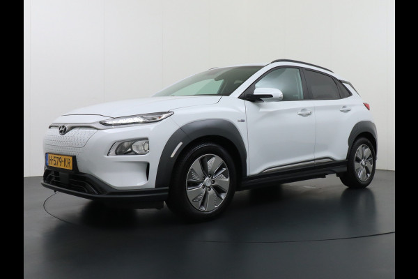 Hyundai Kona 64kWh EV AUT.204pk Krell®-Audio Grootste ACCU Adaptieve Cruise Control Camera Navi Apple Carplay Android Auto Head-Up Display Ec Led Blindspot Monitoring LaneAssist Subwoofer Voorruit verwarmbaar Bluetooth Privacy Glas Lmv 17" Fashion 1e Eigenaar Nieuwprijs €44.210,-