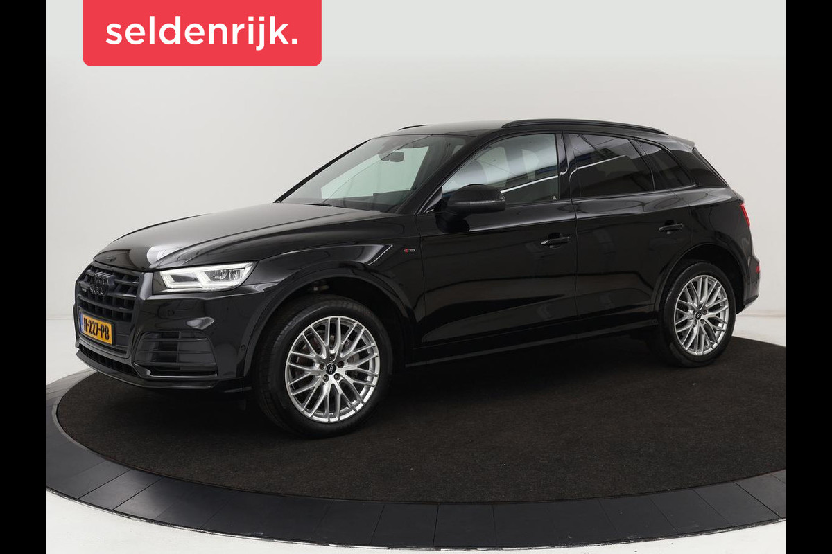 Audi Q5 2.0 TFSI quattro S Line | Stoelverwarming | Carplay | Half leder | Sportstoelen | Full LED | Navigatie | Achterbankverwarming | Park Assist | Virtual Cockpit Audi Q5 2.0 TFSI quattro S Line | Stoelverwarming | Carplay | Half leder | Sportstoelen | Full LED | Navigatie | Achterbankverwarming | Park Assist | Virtual Cockpit