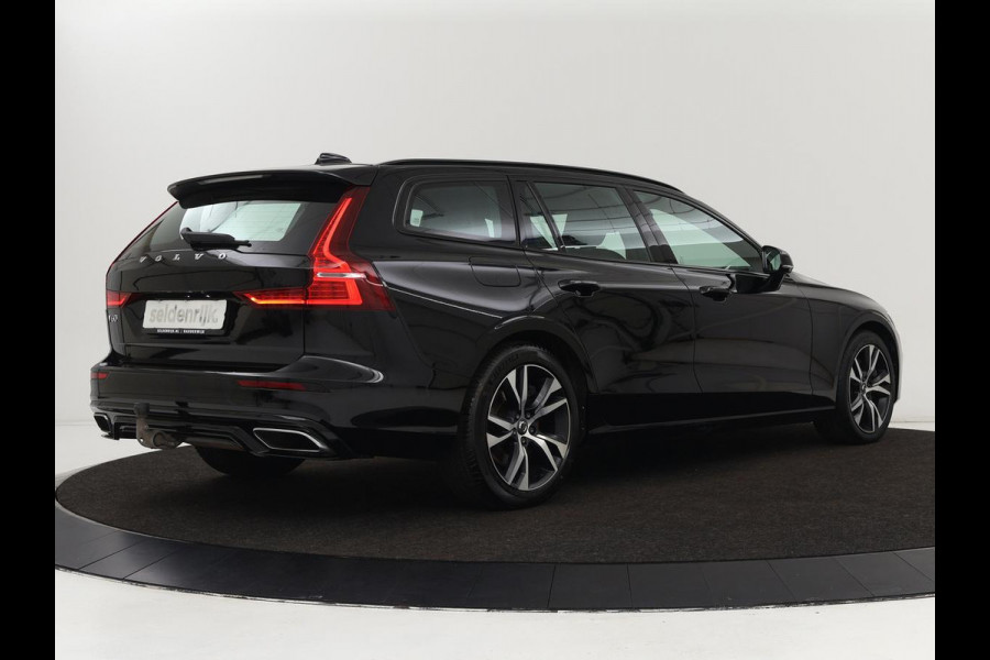 Volvo V60 2.0 T6 Recharge AWD R Design | Trekhaak | Stoelverwarming | Camera | Carplay | Half leder | Full LED | Navigatie | Parkeerhulp
