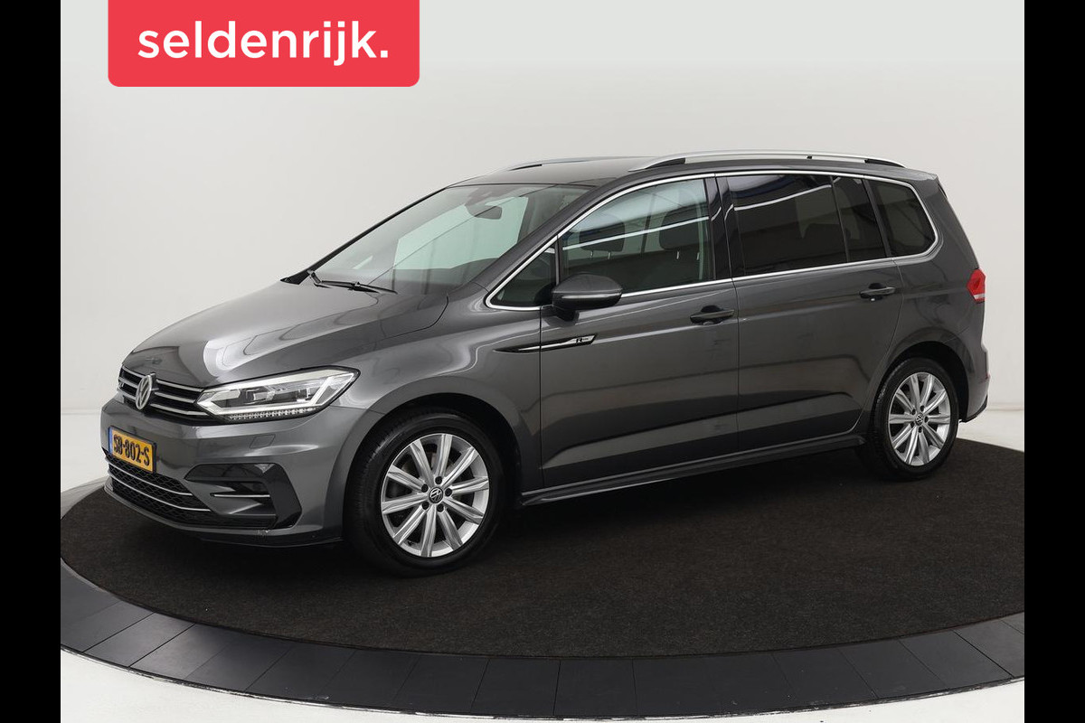 Volkswagen Touran 1.4 TSI R Line 7-persoons | Automaat | Stoelverwarming | Trekhaak | Camera | Massage | Adaptief LED | Parkeerhulp | Adaptive cruise Volkswagen Touran 1.4 TSI R Line 7-persoons | Automaat | Stoelverwarming | Trekhaak | Camera | Massage | Adaptief LED | Parkeerhulp | Adaptive cruise