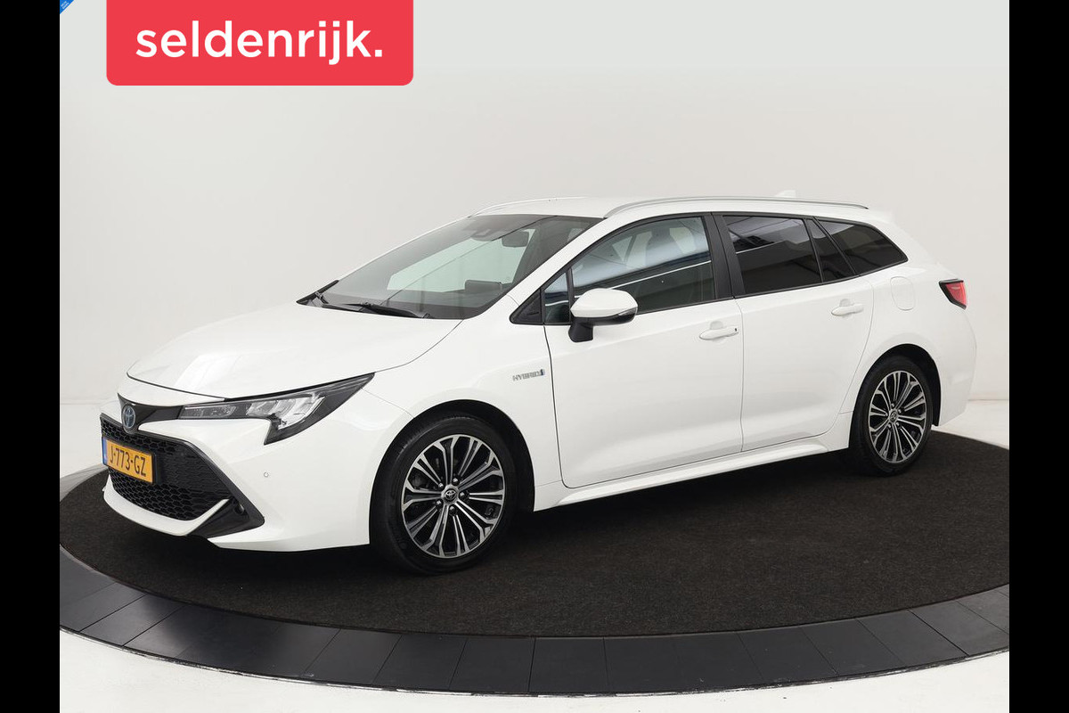 Toyota Corolla 1.8 Hybrid Dynamic | Stoelverwarming | Trekhaak | Camera | Adaptive cruise | Carplay | Navigatie | Parkeerhulp | Climate control Toyota Corolla 1.8 Hybrid Dynamic | Stoelverwarming | Trekhaak | Camera | Adaptive cruise | Carplay | Navigatie | Parkeerhulp | Climate control