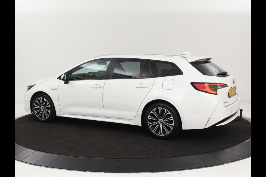 Toyota Corolla 1.8 Hybrid Dynamic | Stoelverwarming | Trekhaak | Camera | Adaptive cruise | Carplay | Navigatie | Parkeerhulp | Climate control