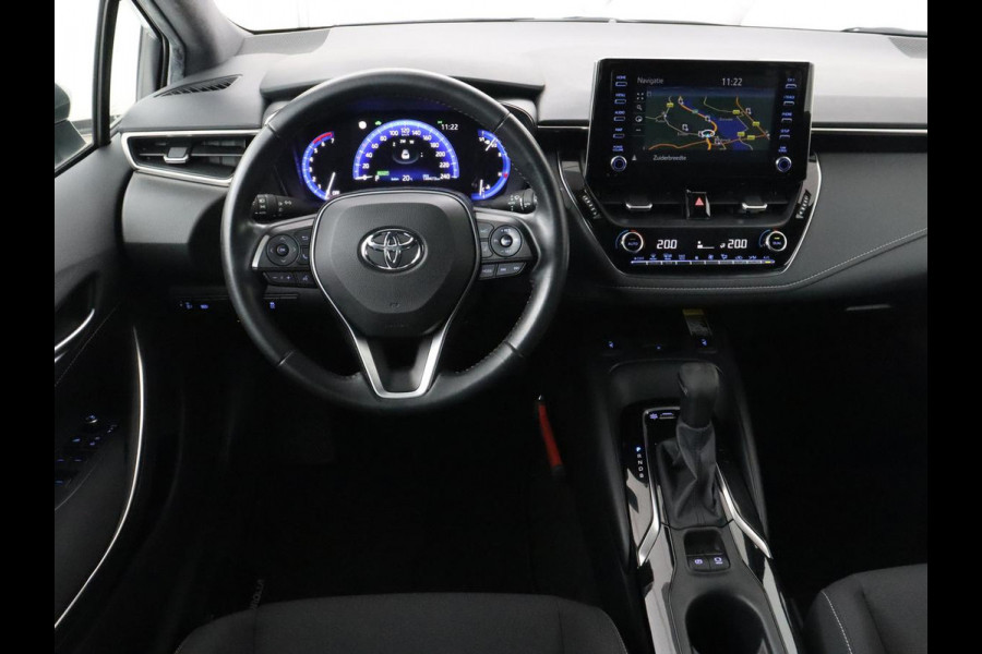 Toyota Corolla 1.8 Hybrid Dynamic | Stoelverwarming | Trekhaak | Camera | Adaptive cruise | Carplay | Navigatie | Parkeerhulp | Climate control