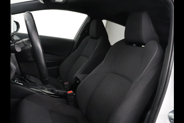 Toyota Corolla 1.8 Hybrid Dynamic | Stoelverwarming | Trekhaak | Camera | Adaptive cruise | Carplay | Navigatie | Parkeerhulp | Climate control