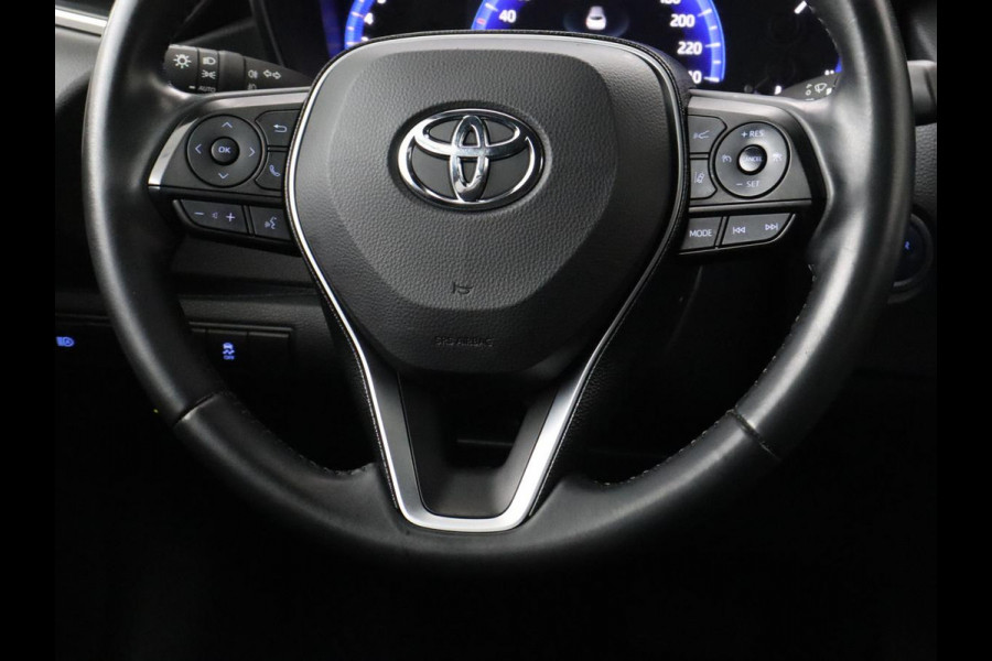 Toyota Corolla 1.8 Hybrid Dynamic | Stoelverwarming | Trekhaak | Camera | Adaptive cruise | Carplay | Navigatie | Parkeerhulp | Climate control
