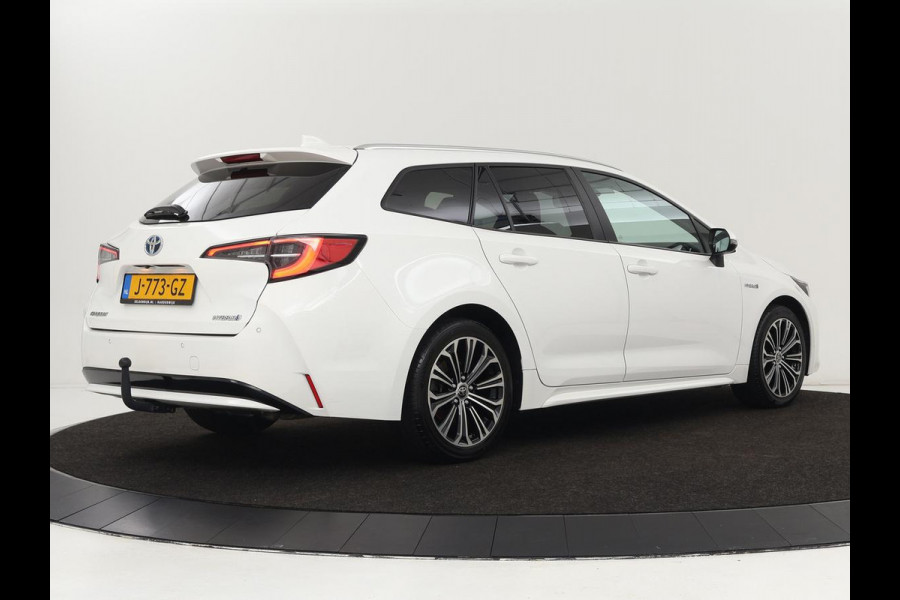 Toyota Corolla 1.8 Hybrid Dynamic | Stoelverwarming | Trekhaak | Camera | Adaptive cruise | Carplay | Navigatie | Parkeerhulp | Climate control