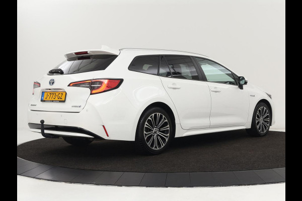 Toyota Corolla 1.8 Hybrid Dynamic | Stoelverwarming | Trekhaak | Camera | Adaptive cruise | Carplay | Navigatie | Parkeerhulp | Climate control