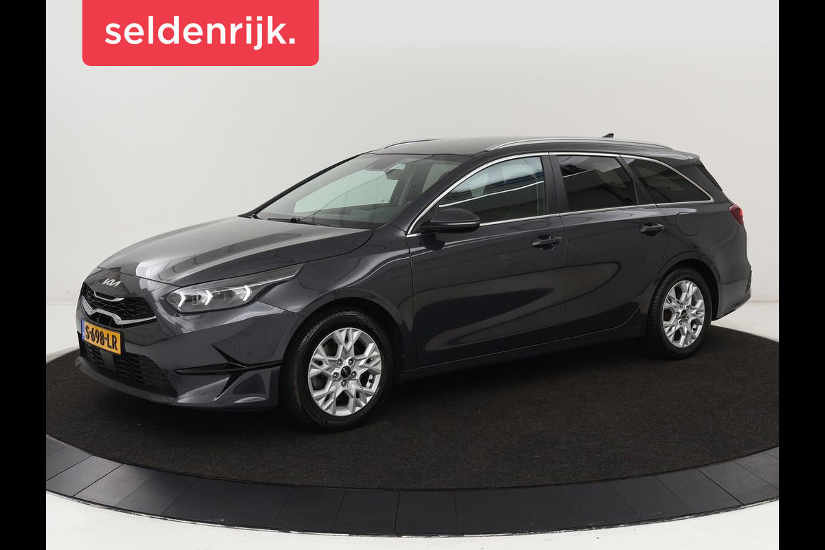 Kia Ceed 1.0 T-GDi DynamicPlusLine | Stoel & stuurverwarming | Trekhaak | Adaptive cruise | Camera | Half leder | Keyless | Full LED | Carplay | Navigatie | Climate control | Parkeerhulp Kia Ceed 1.0 T-GDi DynamicPlusLine | Stoel & stuurverwarming | Trekhaak | Adaptive cruise | Camera | Half leder | Keyless | Full LED | Carplay | Navigatie | Climate control | Parkeerhulp
