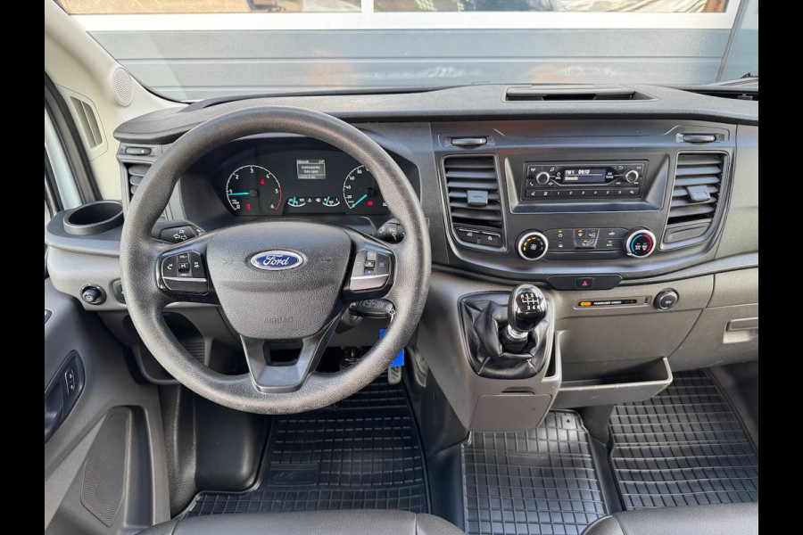 Ford Transit 350 2.0 TDCI L2H1 DC 4WD | Open laadbak | Bluetooth | Kunstleder | 7-persoons | Vierwielaandrijving | Airco | AWD 4x4