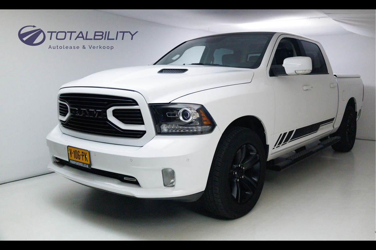 Dodge Ram 1500 5.7 V8 4x4 Quad Cab Sport | Dealer onderhouden | Leer | Stoelverw. & Koeling | Groot mm scherm met touchscreen, Trekhaak, 20" velgen, PRIJS EXCL. BTW!! Dodge Ram 1500 5.7 V8 4x4 Quad Cab Sport | Dealer onderhouden | Leer | Stoelverw. & Koeling | Groot mm scherm met touchscreen, Trekhaak, 20" velgen, PRIJS EXCL. BTW!!