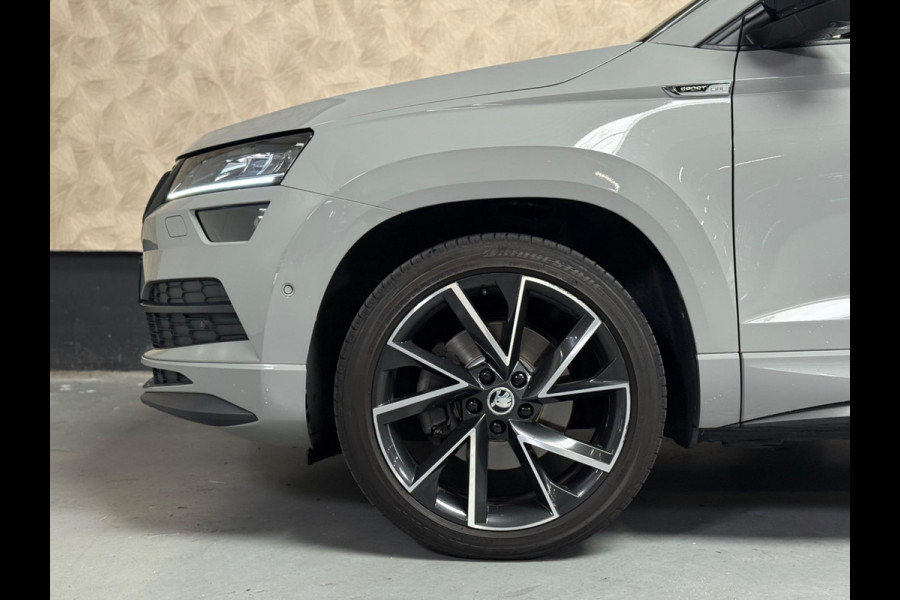 Škoda Karoq 2.0 TSI 4x4 Sportline Business | BTW | Nardo | Pano | Keyless | Trekhaak | 360 Camera | Sfeerverlichting