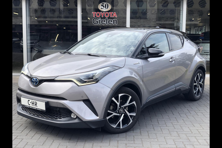 Toyota C-HR 1.8 Hybrid Style Bi-Tone | Trekhaak, JBL, LED Pakket, Navigatie, Dodehoekherkenning, Parkeersensoren, Stoel + Stuurverwarming