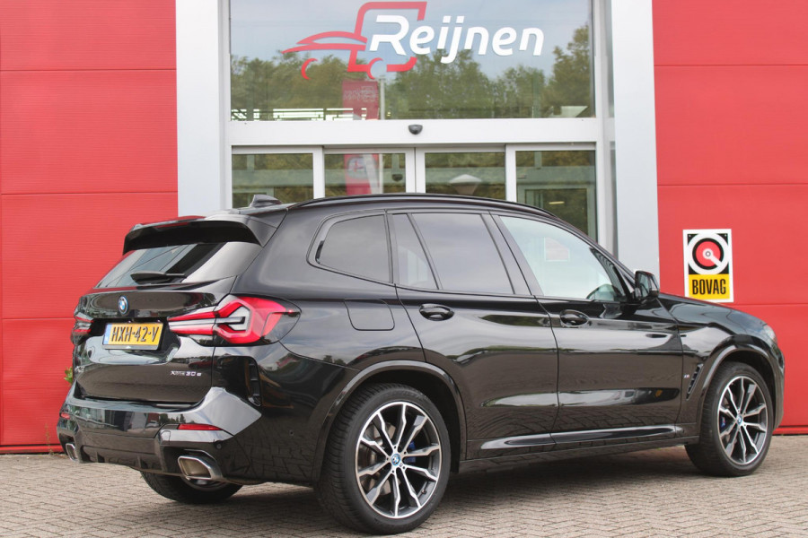 BMW X3 xDrive30e 293PK HIGH EXECUTIVE M SPORT | X-DRIVE | PANORAMISCH SCHUIF/KANTEL DAK | 20" LICHTMETALEN VELGEN | M SPORTREMMEN | COMFORT ACCESS | AKOESTISCH GLAS | VOORSTOELEN ELEKTRISCH VERSTELBAAR MET GEHEUGENFUNCTIE | STOEL VERWARMING | ADAPTIEVE LED KOPLAMPEN | DRIVING ASSISTANT PAKKET | ADAPTIVE CRUISE CONTROL | HEAD UP DISPLAY | DAB+ RADIO | HARMAN KARDON AUDIO SYSTEM | DRAADLOZE TELEFOONLADER | SPORTSTOELEN M-TECHNIC | LEER "VERNASCA" | SHADOW LINE | DRAADLOZE APPLE CARPLAY/ANDROID AUTO | NAVIGATIE | ALARM | ACHTERUITRIJ CAMERA | PARKEERSENSOREN VOOR EN ACHTER | ELE