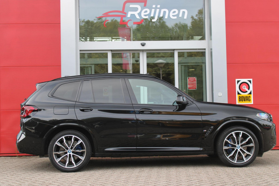 BMW X3 xDrive30e 293PK HIGH EXECUTIVE M SPORT | X-DRIVE | PANORAMISCH SCHUIF/KANTEL DAK | 20" LICHTMETALEN VELGEN | M SPORTREMMEN | COMFORT ACCESS | AKOESTISCH GLAS | VOORSTOELEN ELEKTRISCH VERSTELBAAR MET GEHEUGENFUNCTIE | STOEL VERWARMING | ADAPTIEVE LED KOPLAMPEN | DRIVING ASSISTANT PAKKET | ADAPTIVE CRUISE CONTROL | HEAD UP DISPLAY | DAB+ RADIO | HARMAN KARDON AUDIO SYSTEM | DRAADLOZE TELEFOONLADER | SPORTSTOELEN M-TECHNIC | LEER "VERNASCA" | SHADOW LINE | DRAADLOZE APPLE CARPLAY/ANDROID AUTO | NAVIGATIE | ALARM | ACHTERUITRIJ CAMERA | PARKEERSENSOREN VOOR EN ACHTER | ELE