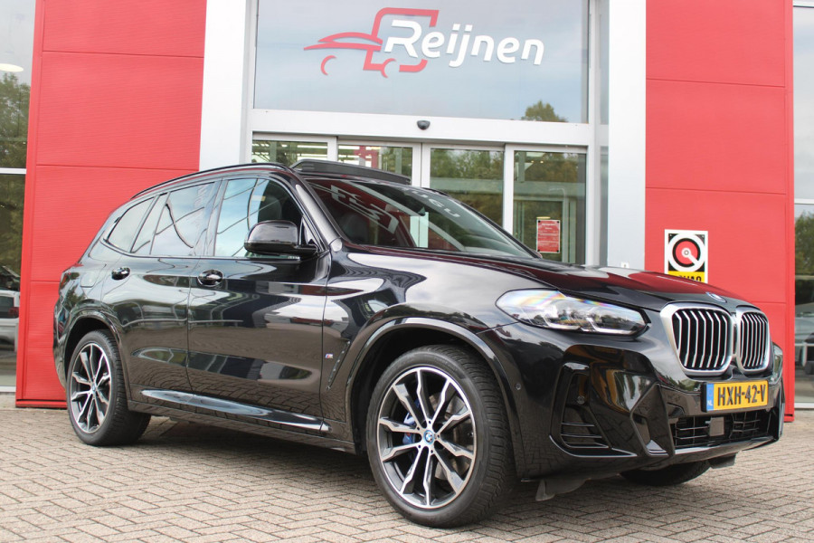 BMW X3 xDrive30e 293PK HIGH EXECUTIVE M SPORT | X-DRIVE | PANORAMISCH SCHUIF/KANTEL DAK | 20" LICHTMETALEN VELGEN | M SPORTREMMEN | COMFORT ACCESS | AKOESTISCH GLAS | VOORSTOELEN ELEKTRISCH VERSTELBAAR MET GEHEUGENFUNCTIE | STOEL VERWARMING | ADAPTIEVE LED KOPLAMPEN | DRIVING ASSISTANT PAKKET | ADAPTIVE CRUISE CONTROL | HEAD UP DISPLAY | DAB+ RADIO | HARMAN KARDON AUDIO SYSTEM | DRAADLOZE TELEFOONLADER | SPORTSTOELEN M-TECHNIC | LEER "VERNASCA" | SHADOW LINE | DRAADLOZE APPLE CARPLAY/ANDROID AUTO | NAVIGATIE | ALARM | ACHTERUITRIJ CAMERA | PARKEERSENSOREN VOOR EN ACHTER | ELE