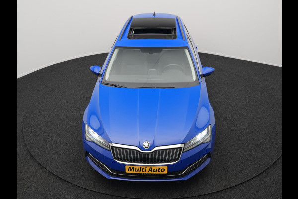Škoda Superb Combi 1.4 TSI iV Business Edition Plus Plug In Hybrid 218pk Dealer O.H PHEV | Trekhaak Af Fabriek | Panodak | Cruise Control | Camera | Sportstoelen Verwarmd | Crystal LED | Apple Carplay | Navigatie | DAB |