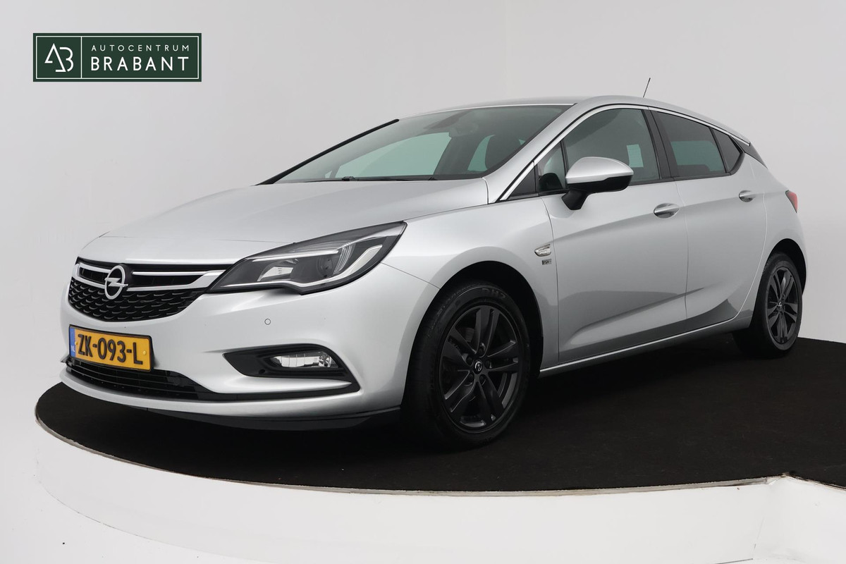 Opel Astra 1.4 Turbo 120 Jaar Edition (PARKEERSENSOREN, CRUISE CONTROL, NAVIGATIE, BLUETOOTH, AUTOMAAT. NL-AUTO) Opel Astra 1.4 Turbo 120 Jaar Edition (PARKEERSENSOREN, CRUISE CONTROL, NAVIGATIE, BLUETOOTH, AUTOMAAT. NL-AUTO)