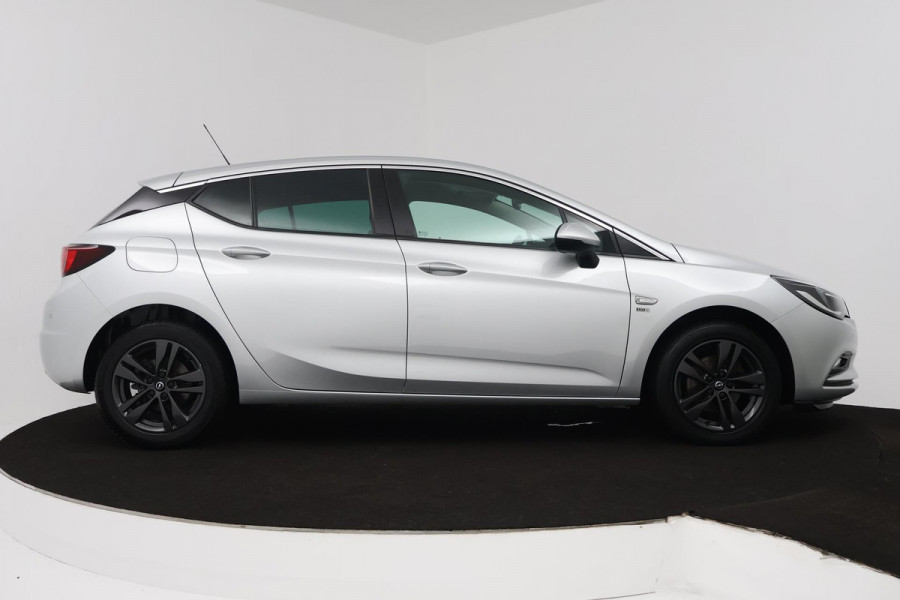Opel Astra 1.4 Turbo 120 Jaar Edition (PARKEERSENSOREN, CRUISE CONTROL, NAVIGATIE, BLUETOOTH, AUTOMAAT. NL-AUTO)