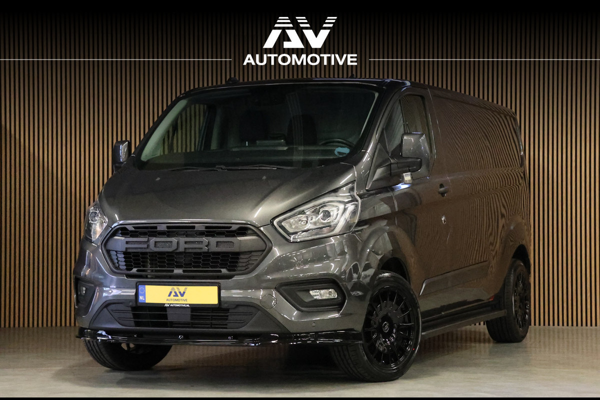 Ford Transit Custom 300 2.0 TDCI L2H1 | Raptor Edition | Blind Spot | Camera | Navigatie | CarPlay | Stoelverwarming | Airco | PDC V+A | MF Stuur | Dealer onderhouden | Fabrieksgarantie tot 05-2027 | Nieuwe APK Ford Transit Custom 300 2.0 TDCI L2H1 | Raptor Edition | Blind Spot | Camera | Navigatie | CarPlay | Stoelverwarming | Airco | PDC V+A | MF Stuur | Dealer onderhouden | Fabrieksgarantie tot 05-2027 | Nieuwe APK
