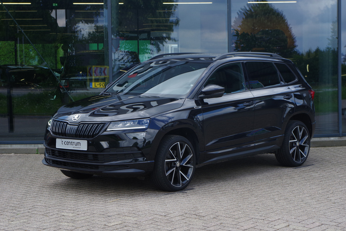 Škoda Karoq 1.5 TSI ACT Sportline 150 PK Automaat BNS, Trekhaak, Keyless, Winterpakket, Camera Škoda Karoq 1.5 TSI ACT Sportline 150 PK Automaat BNS, Trekhaak, Keyless, Winterpakket, Camera