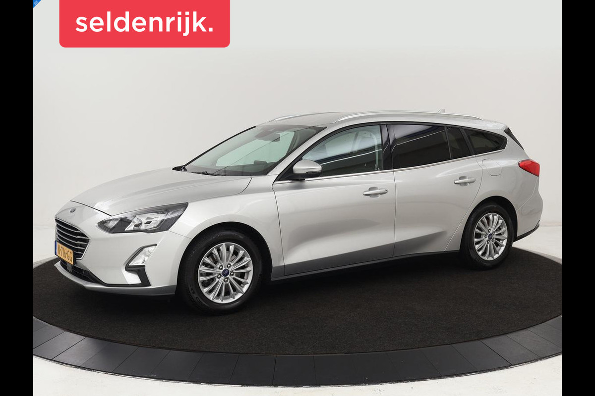 Ford Focus 1.0 EcoBoost Hybrid Titanium X | Stoel & stuurverwarming | Camera | Trekhaak | Carplay | Digital Cockpit | Full LED | Keyless Ford Focus 1.0 EcoBoost Hybrid Titanium X | Stoel & stuurverwarming | Camera | Trekhaak | Carplay | Digital Cockpit | Full LED | Keyless