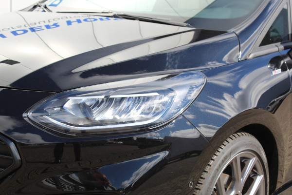 Ford Fiesta 1.0-100pk EcoBoost ST-Line. Luxe en sportieve Fiesta ! Stoel-, stuur- en voorraamverwarming, keyless entry/keyless go, adaptive cruise cntrl, volautm. airco, camera, parkeersensoren v+a, navigatie by Apple/Android, LM wln, lane assist, LED verlic