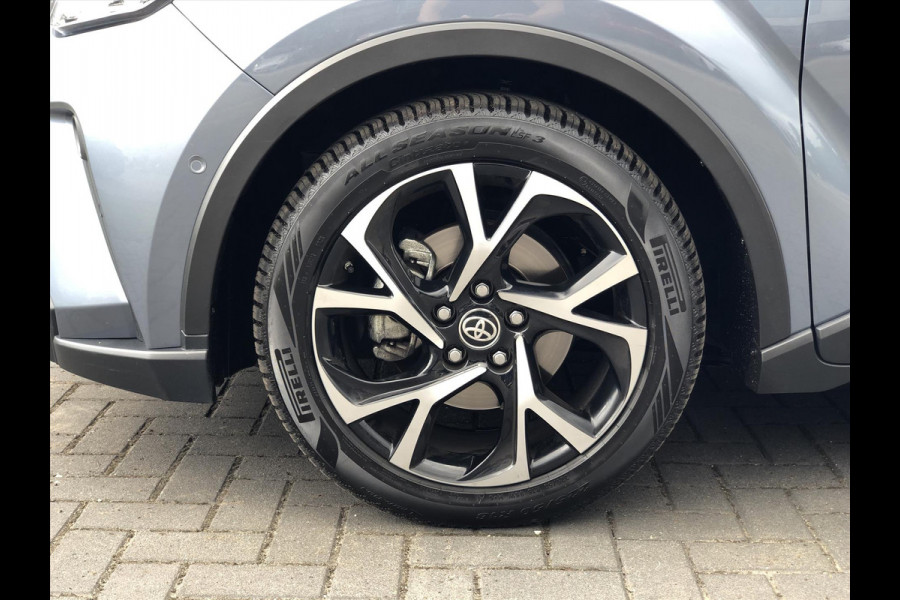 Toyota C-HR 2.0 Hybrid 184pk Bi-Tone | Dodehoekherkenning, Stoel + Stuurverwarming, Parkeersensoren, Apple CarPlay/Android Auto, 18 inch, Ke