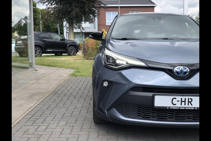 Toyota C-HR 2.0 Hybrid 184pk Bi-Tone | Dodehoekherkenning, Stoel + Stuurverwarming, Parkeersensoren, Apple CarPlay/Android Auto, 18 inch, Ke