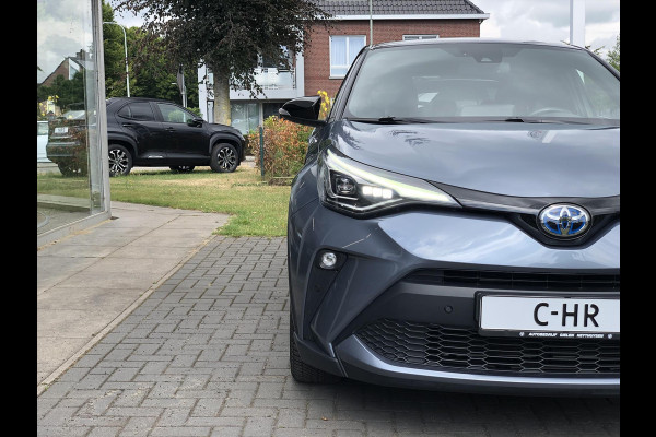 Toyota C-HR 2.0 Hybrid 184pk Bi-Tone | Dodehoekherkenning, Stoel + Stuurverwarming, Parkeersensoren, Apple CarPlay/Android Auto, 18 inch, Ke