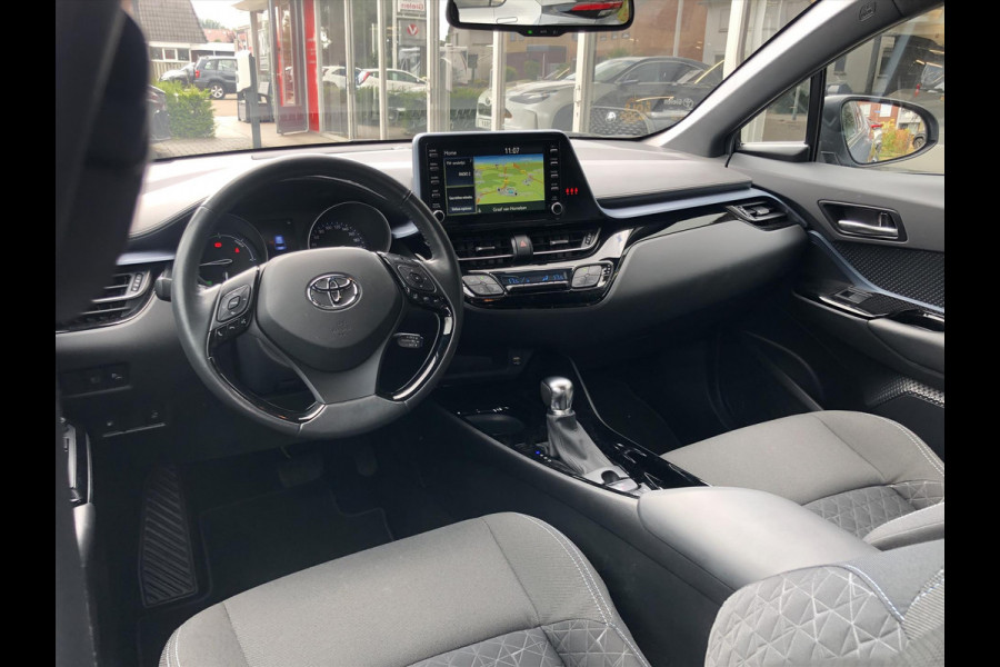 Toyota C-HR 2.0 Hybrid 184pk Bi-Tone | Dodehoekherkenning, Stoel + Stuurverwarming, Parkeersensoren, Apple CarPlay/Android Auto, 18 inch, Ke