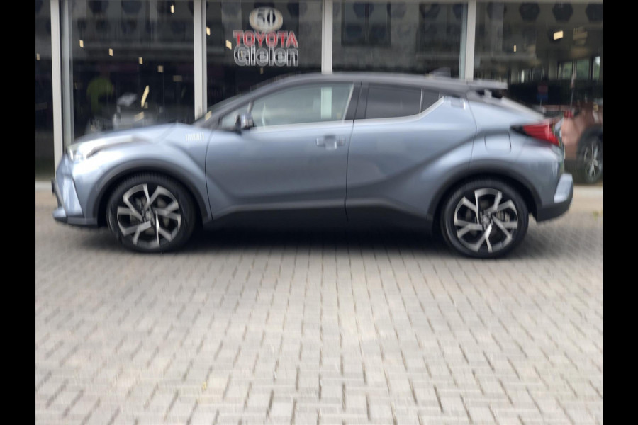 Toyota C-HR 2.0 Hybrid 184pk Bi-Tone | Dodehoekherkenning, Stoel + Stuurverwarming, Parkeersensoren, Apple CarPlay/Android Auto, 18 inch, Ke