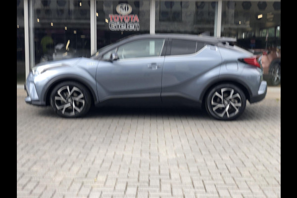 Toyota C-HR 2.0 Hybrid 184pk Bi-Tone | Dodehoekherkenning, Stoel + Stuurverwarming, Parkeersensoren, Apple CarPlay/Android Auto, 18 inch, Ke