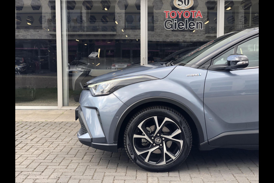 Toyota C-HR 2.0 Hybrid 184pk Bi-Tone | Dodehoekherkenning, Stoel + Stuurverwarming, Parkeersensoren, Apple CarPlay/Android Auto, 18 inch, Ke