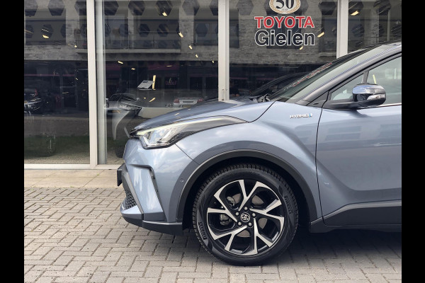Toyota C-HR 2.0 Hybrid 184pk Bi-Tone | Dodehoekherkenning, Stoel + Stuurverwarming, Parkeersensoren, Apple CarPlay/Android Auto, 18 inch, Ke