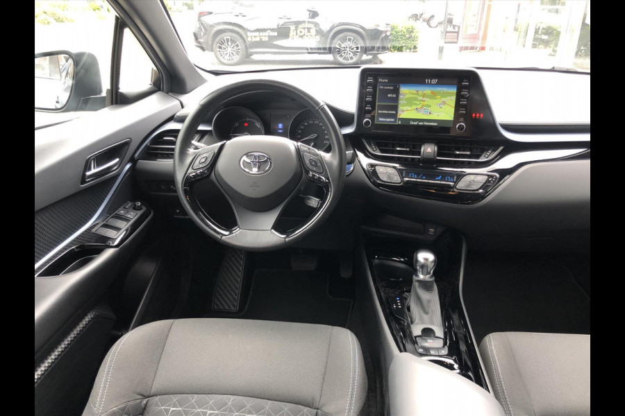 Toyota C-HR 2.0 Hybrid 184pk Bi-Tone | Dodehoekherkenning, Stoel + Stuurverwarming, Parkeersensoren, Apple CarPlay/Android Auto, 18 inch, Ke