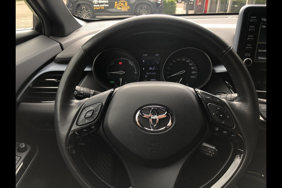 Toyota C-HR 2.0 Hybrid 184pk Bi-Tone | Dodehoekherkenning, Stoel + Stuurverwarming, Parkeersensoren, Apple CarPlay/Android Auto, 18 inch, Ke