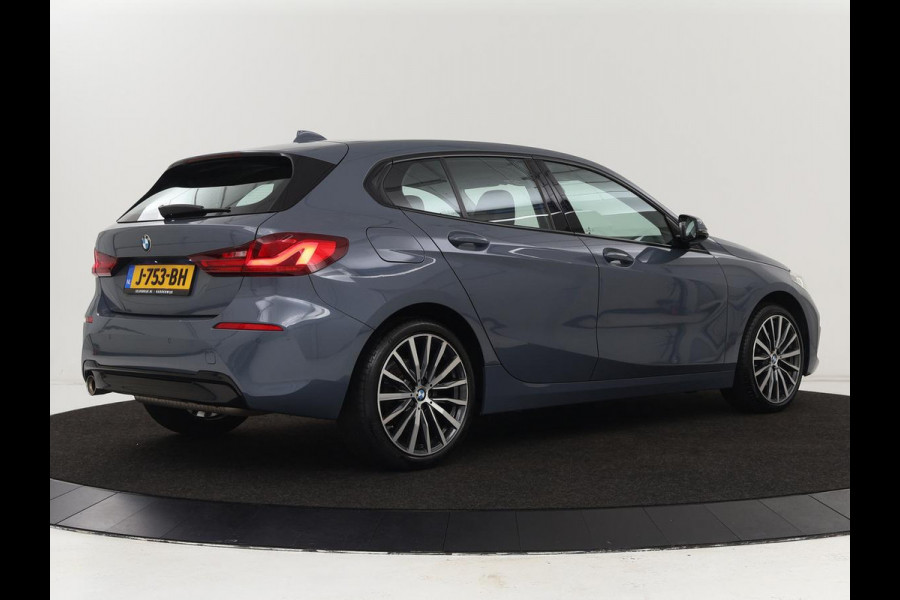 BMW 1-serie 118i Executive Edition | Sport Line | Carplay | Sportstoelen | Half leder | Live Cockpit | Climate control | Parkeerhulp | Cruise control | 'Storm Bay' Metallic