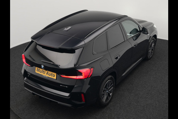 BMW X1 sDrive18i M-Sport Automaat 136pk Dealer O.H. | Trekhaak af Fabriek | Alcantara Sportstoelen Memory & Verwarmd | Camera | Cruise Control | Blis | Park Assist | Apple Carplay | Navigatie | Sfeerverlichting |