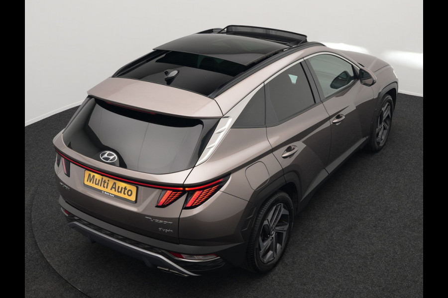 Hyundai Tucson 1.6 T-GDI Premium 4WD Plug In Hybrid 265pk Dealer O.H. PHEV | Panodak | Trekhaak Afneembaar | Adaptive Cruise | Lederen Sportstoelen Memory & Ventilatie | Krell Audio | Stoel & Stuurverwarming | Navigatie | Apple Carplay | Camera | Virtual |