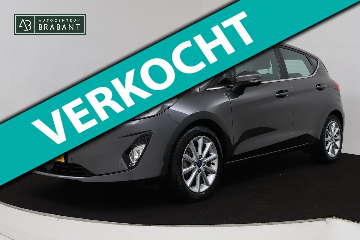 Ford Fiesta 1.0 EcoBoost Titanium (NAVI, CAMERA, STOELVERWARMING, PARKEERSENSOREN, AUTO INPARKEREN, GOED ONDERHOUDEN) Ford Fiesta 1.0 EcoBoost Titanium (NAVI, CAMERA, STOELVERWARMING, PARKEERSENSOREN, AUTO INPARKEREN, GOED ONDERHOUDEN)
