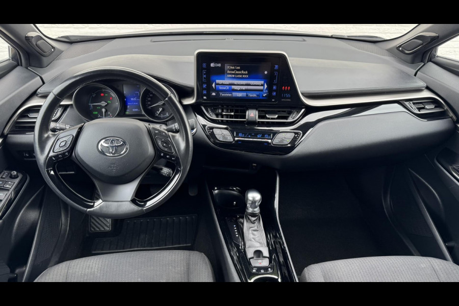 Toyota C-HR 1.8 Hybrid Style Cruise control Climate control Stoelverwarming JBL Parkeersensoren voor/achter Achteruitrijcamera